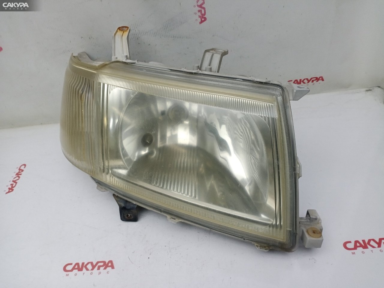 Фара правая Toyota Probox NCP51V 1NZ-FE 52-075: купить в Сакура Красноярск.