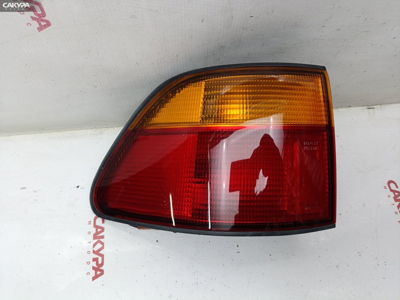 Фонарь стоп-сигнала левый Honda Partner EY7 D15B 043-2204: купить в Сакура Красноярск.