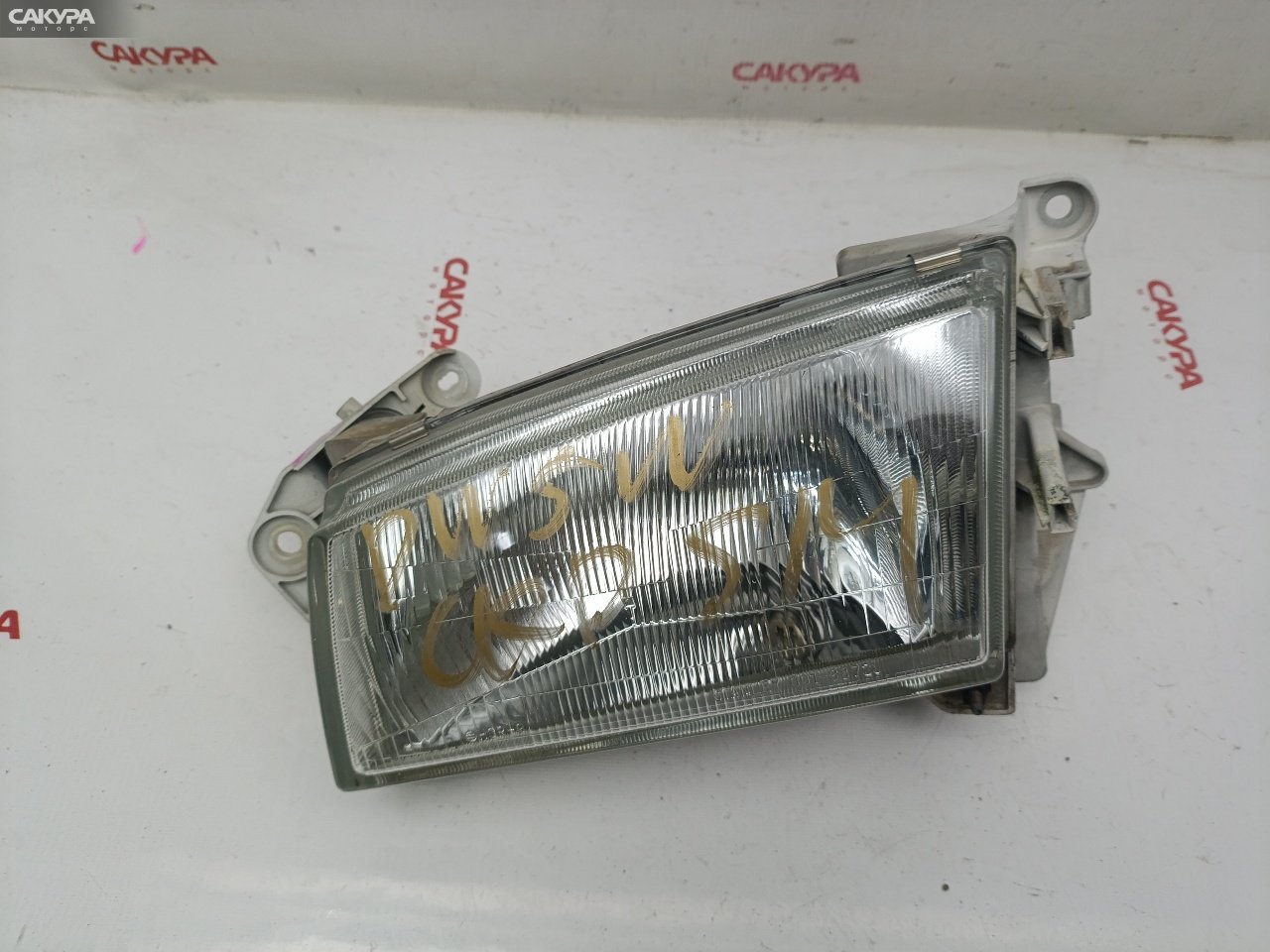 Фара левая Mazda Demio DW5W B5-ME 001-6872: купить в Сакура Красноярск.