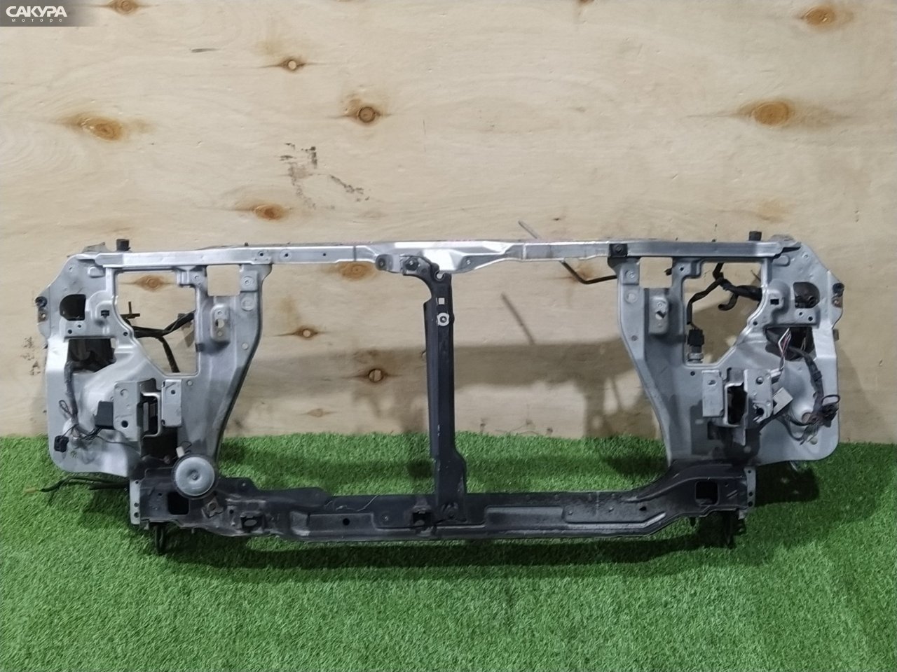 Рамка радиатора Mazda Demio DW3W B3-ME: купить в Сакура Красноярск.
