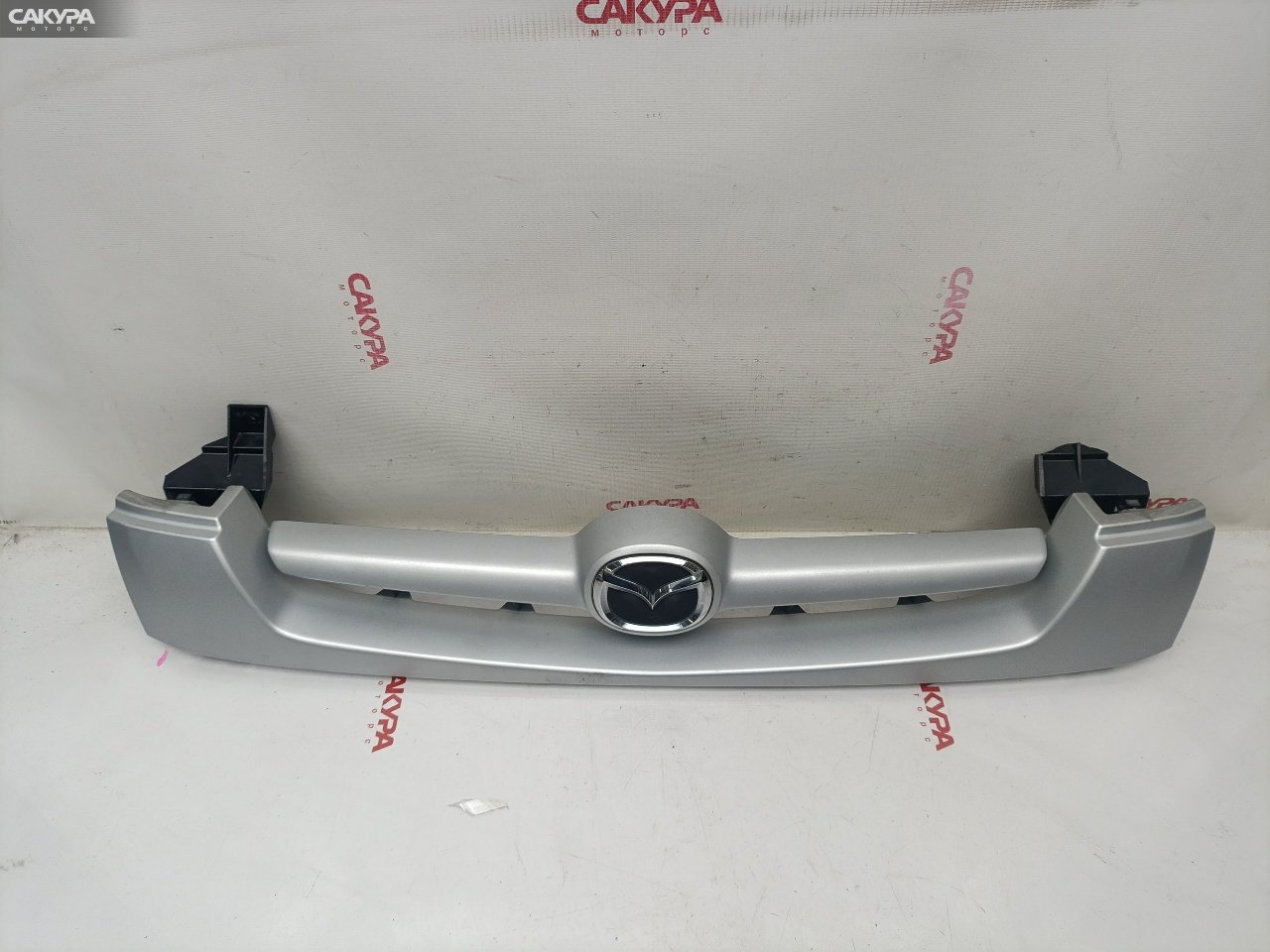 Решетка радиатора Mazda Demio DW3W B3-ME: купить в Сакура Красноярск.