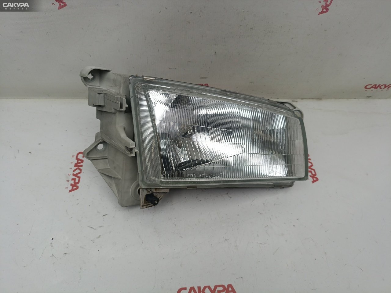 Фара правая Mazda Demio DW3W B3-ME 001-6872: купить в Сакура Красноярск.