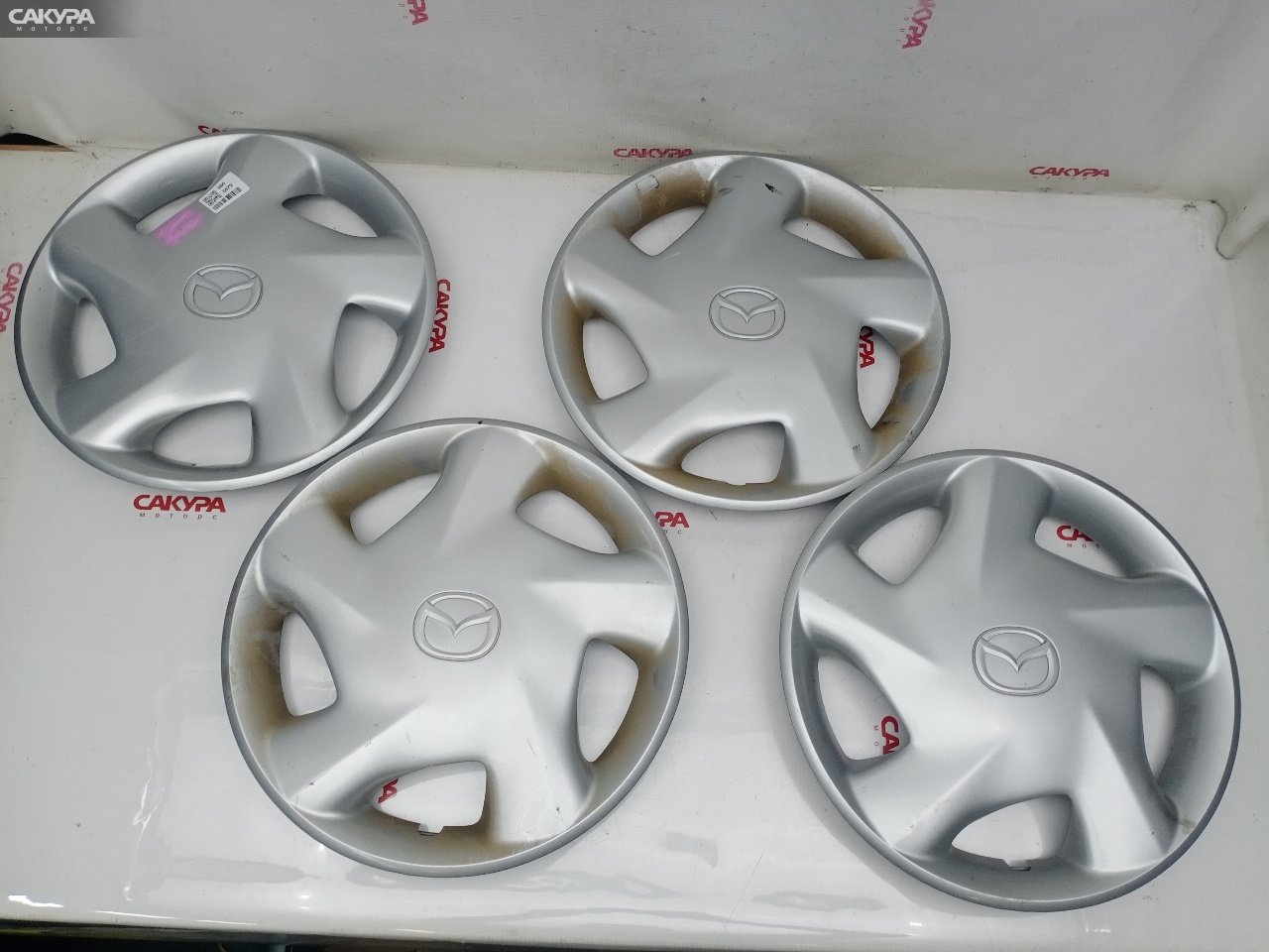 Колпак Mazda Demio DW3W B3E: купить в Сакура Красноярск.