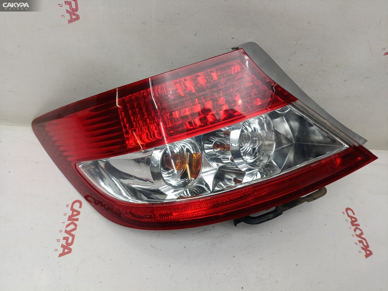 Фонарь стоп-сигнала левый Honda FIT Aria GD8 L15A P3023: купить в Сакура Красноярск.