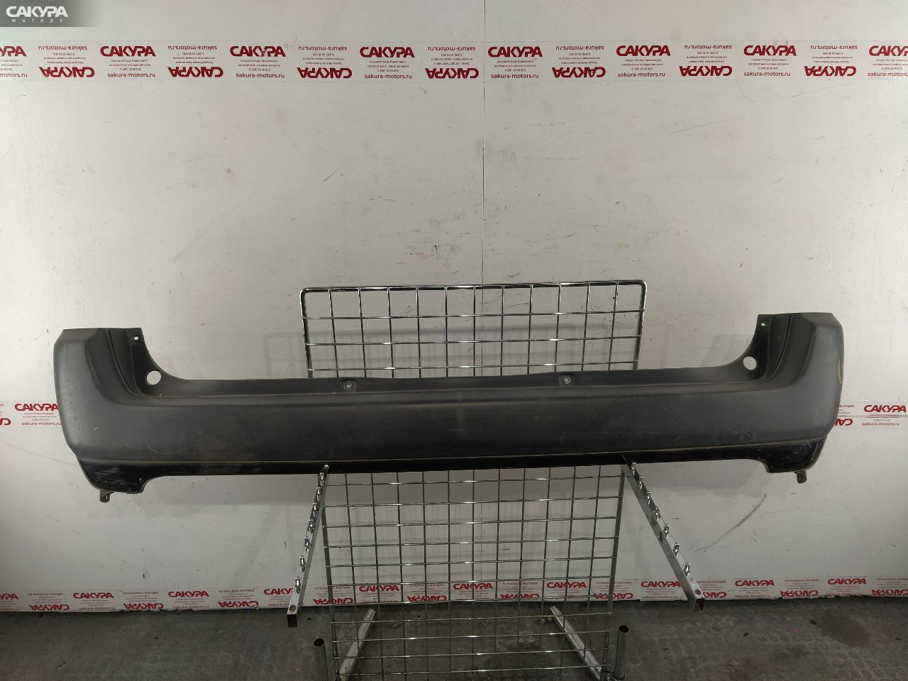 Бампер задний Toyota Probox NCP59G 1NZ-FE: купить в Сакура Красноярск.