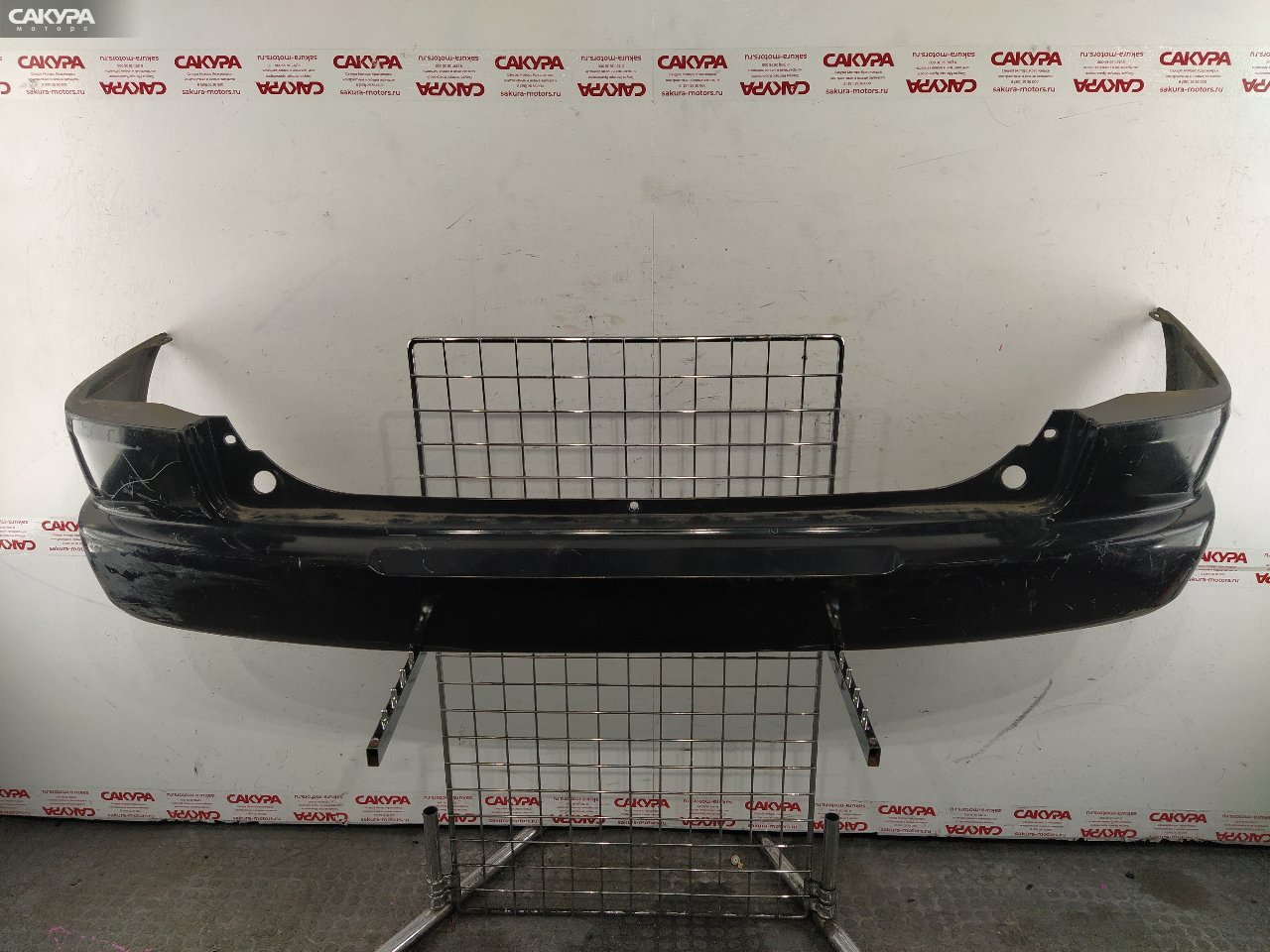 Бампер задний Mazda Demio DW5W B5-ME A4A2: купить в Сакура Красноярск.