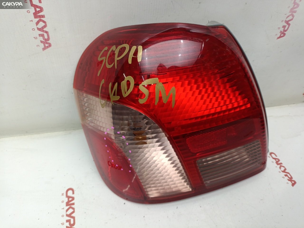 Фонарь стоп-сигнала левый Toyota Platz SCP11 1SZ-FE 52-013: купить в Сакура Красноярск.