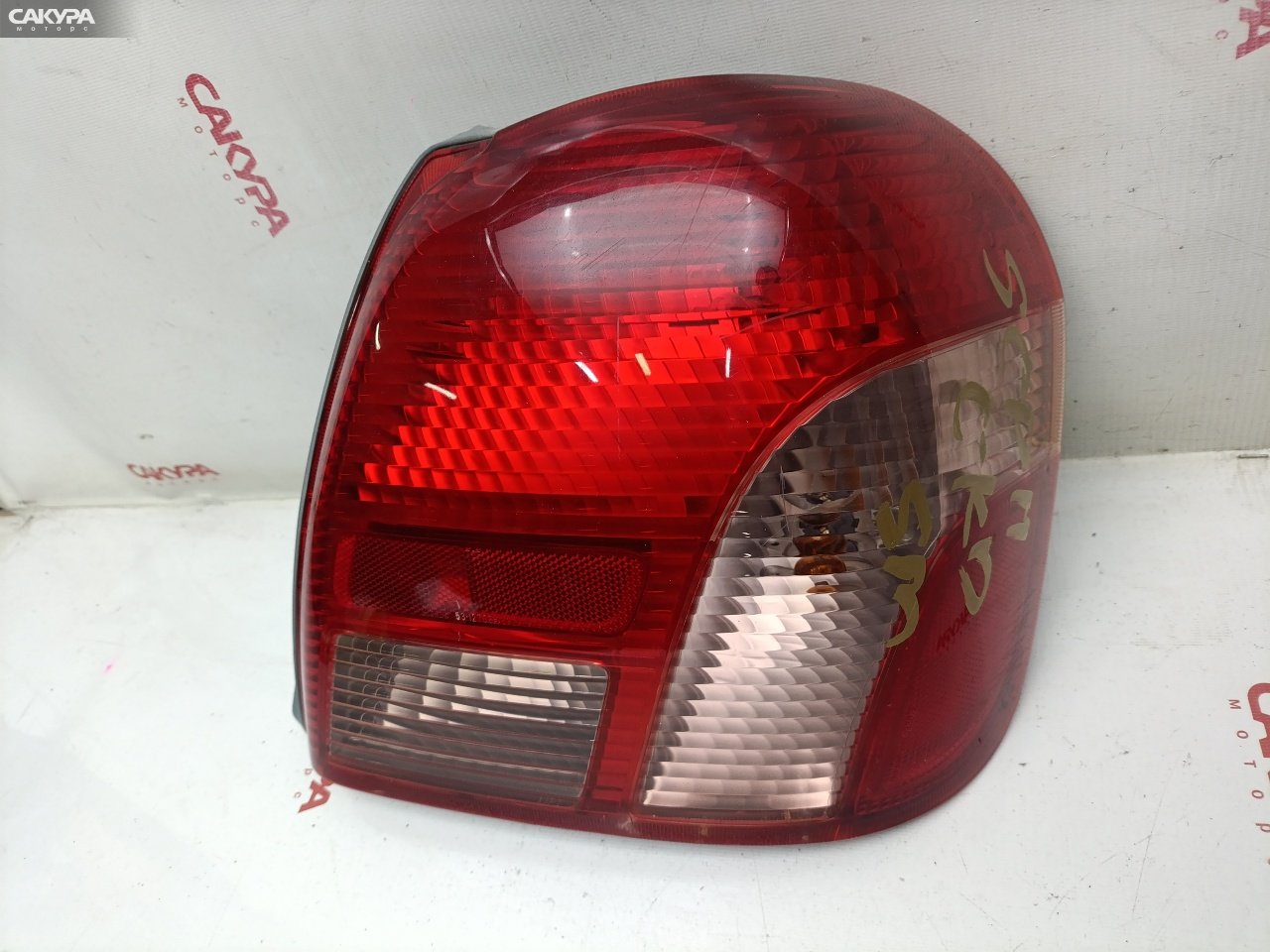Фонарь стоп-сигнала правый Toyota Platz SCP11 1SZ-FE 52-013: купить в Сакура Красноярск.