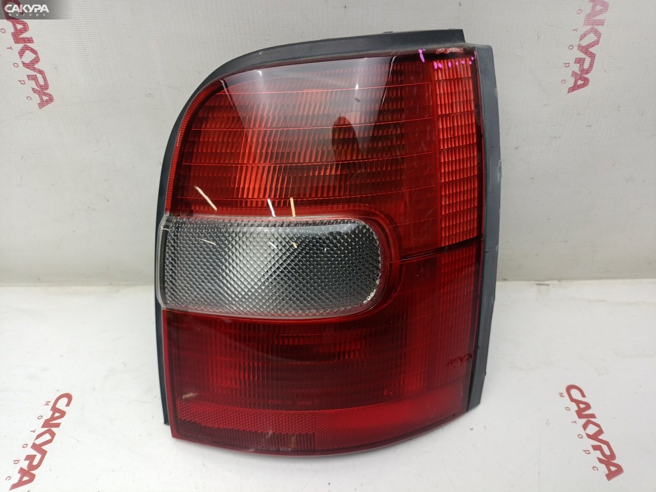 Фонарь стоп-сигнала правый Nissan March K11 CG10DE 4786: купить в Сакура Красноярск.