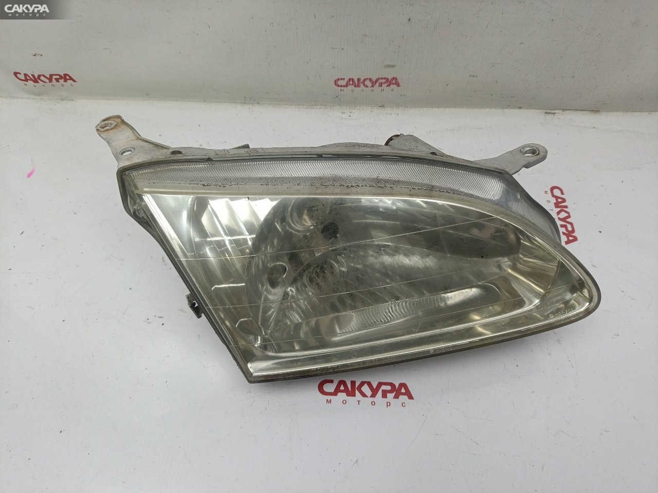 Фара правая Toyota Corolla Spacio AE111N 4A-FE 13-38: купить в Сакура Красноярск.