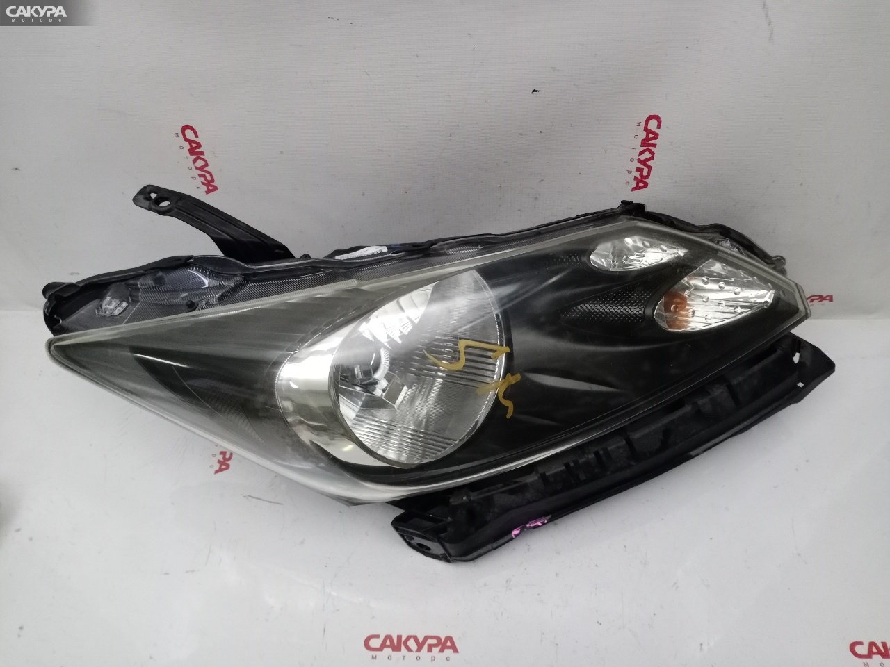 Фара правая Honda Freed GB4 L15A 100-22838: купить в Сакура Красноярск.