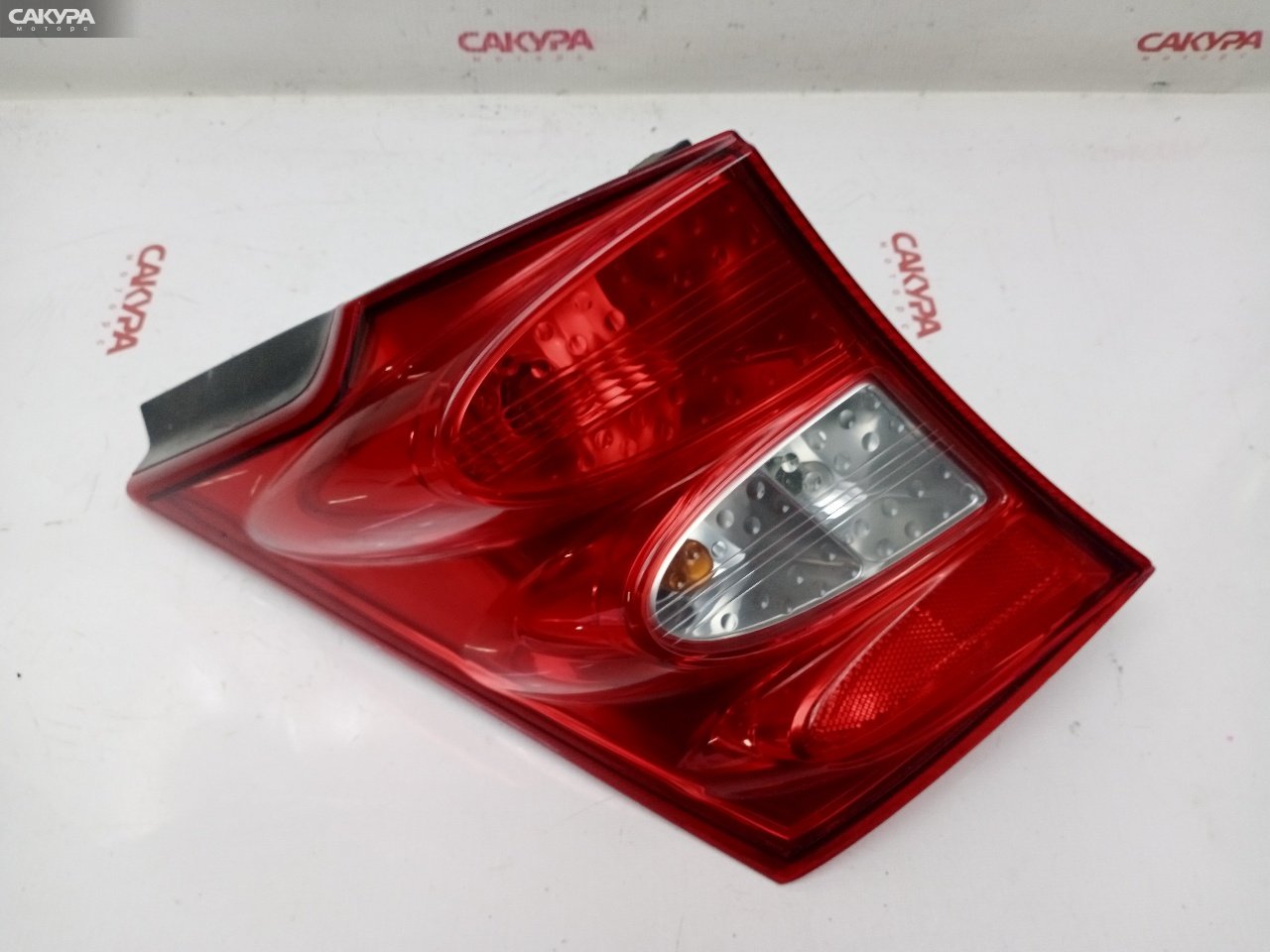 Фонарь стоп-сигнала левый Honda Freed GB4 L15A D065: купить в Сакура Красноярск.