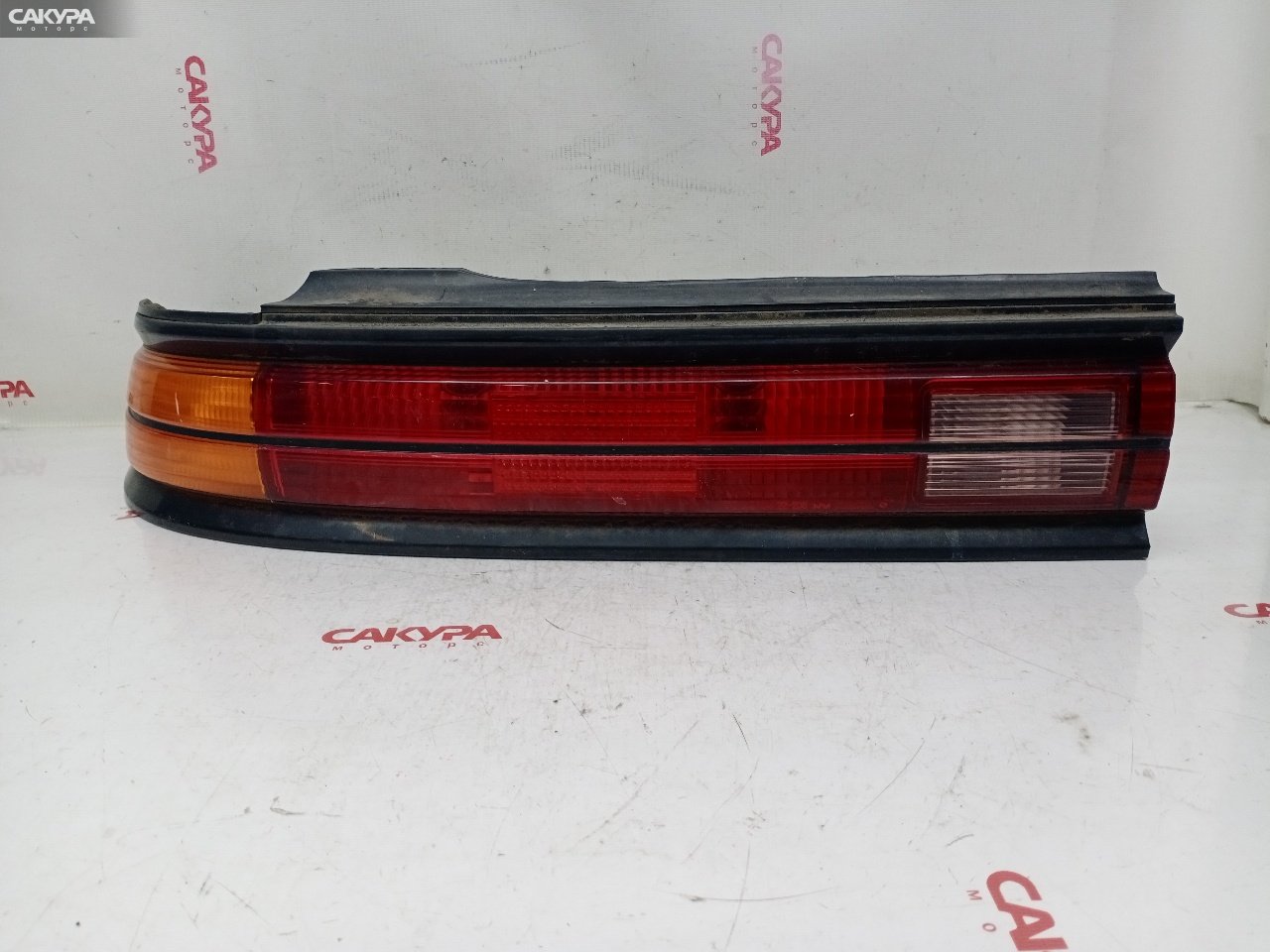 Фонарь стоп-сигнала левый Toyota Mark II GX90 1G-FE 22-238: купить в Сакура Красноярск.