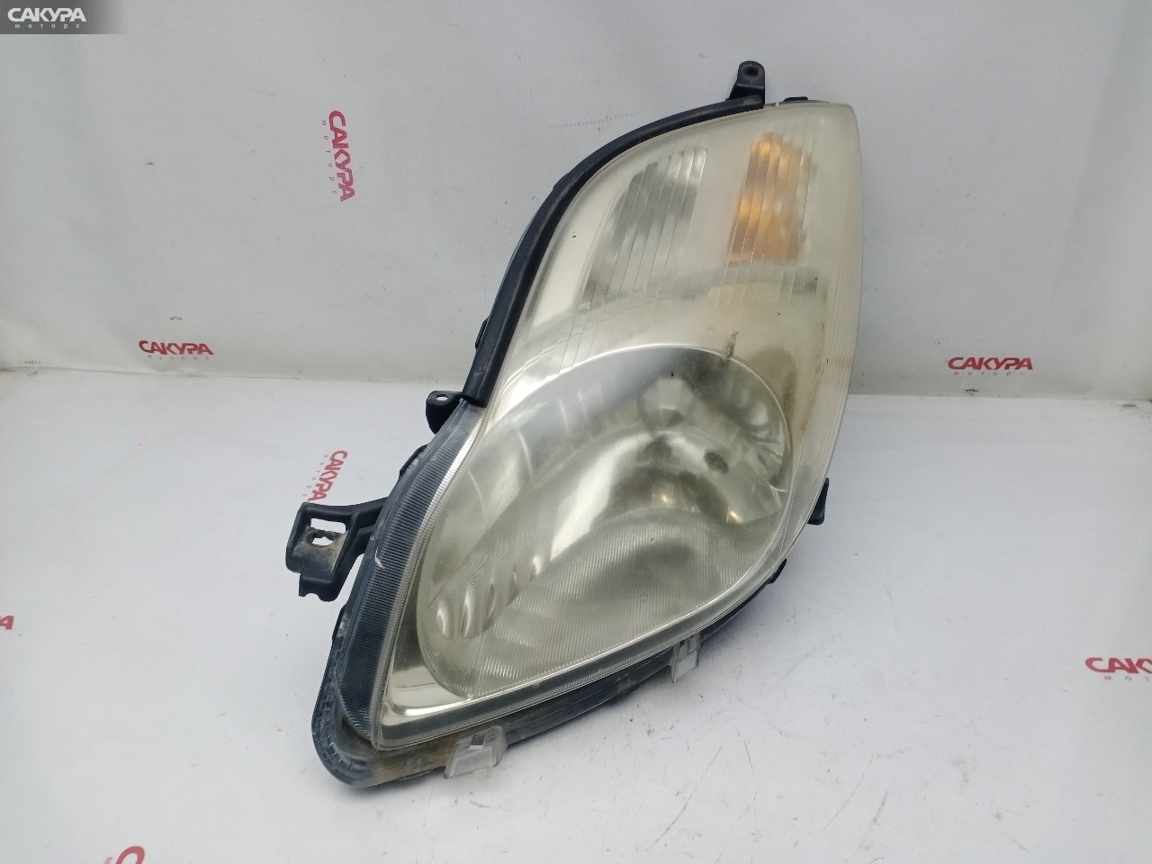Фара левая Toyota Vitz SCP90 2SZ-FE 52-183: купить в Сакура Красноярск.