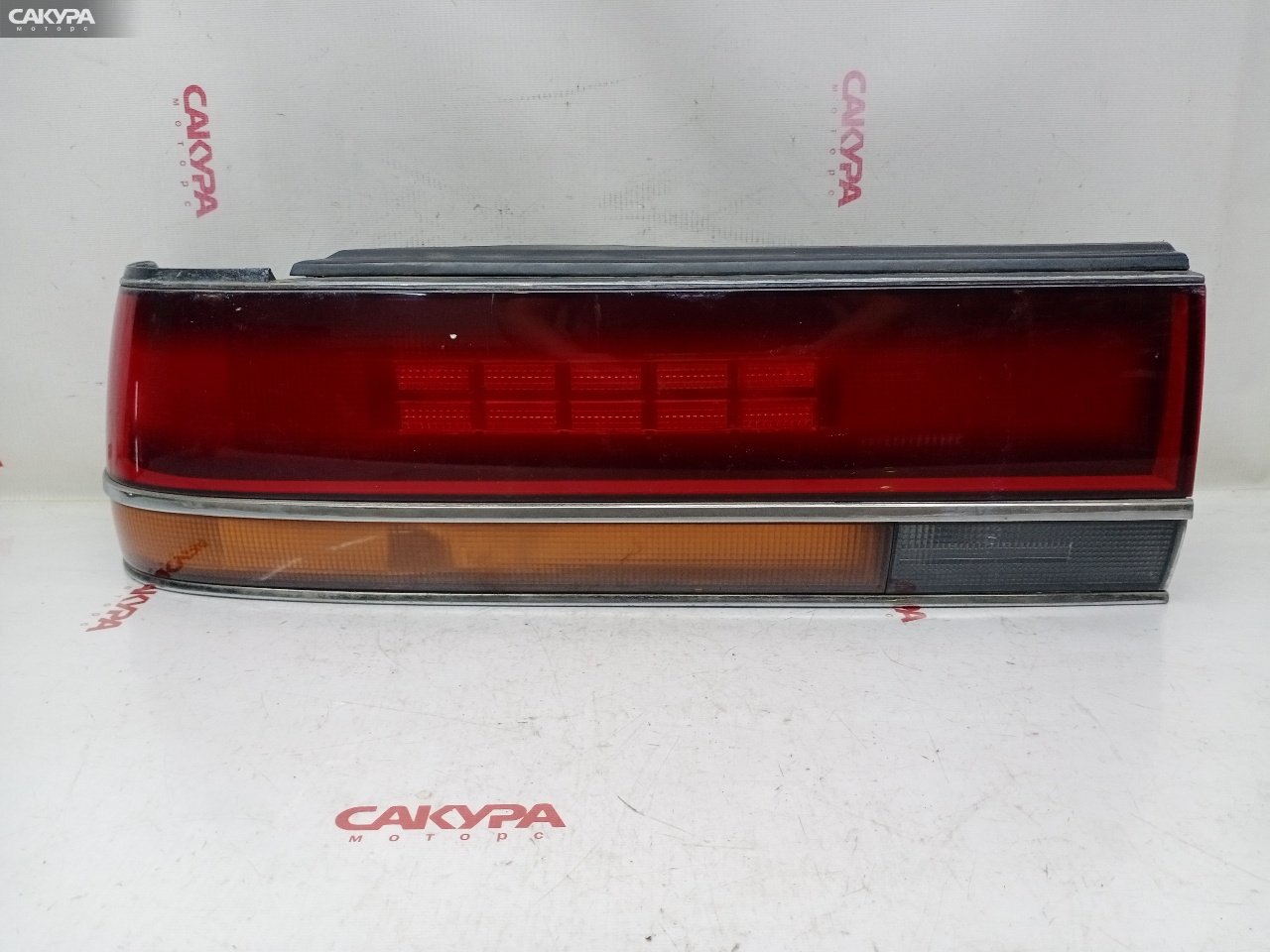 Фонарь стоп-сигнала левый Toyota Chaser GX81 1G-FE 22-196: купить в Сакура Красноярск.