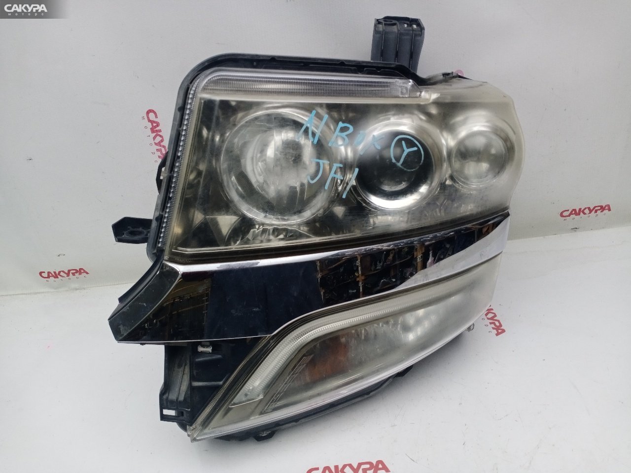 Фара левая Honda N-BOX CUSTOM JF1 S07A 100-62038: купить в Сакура Красноярск.