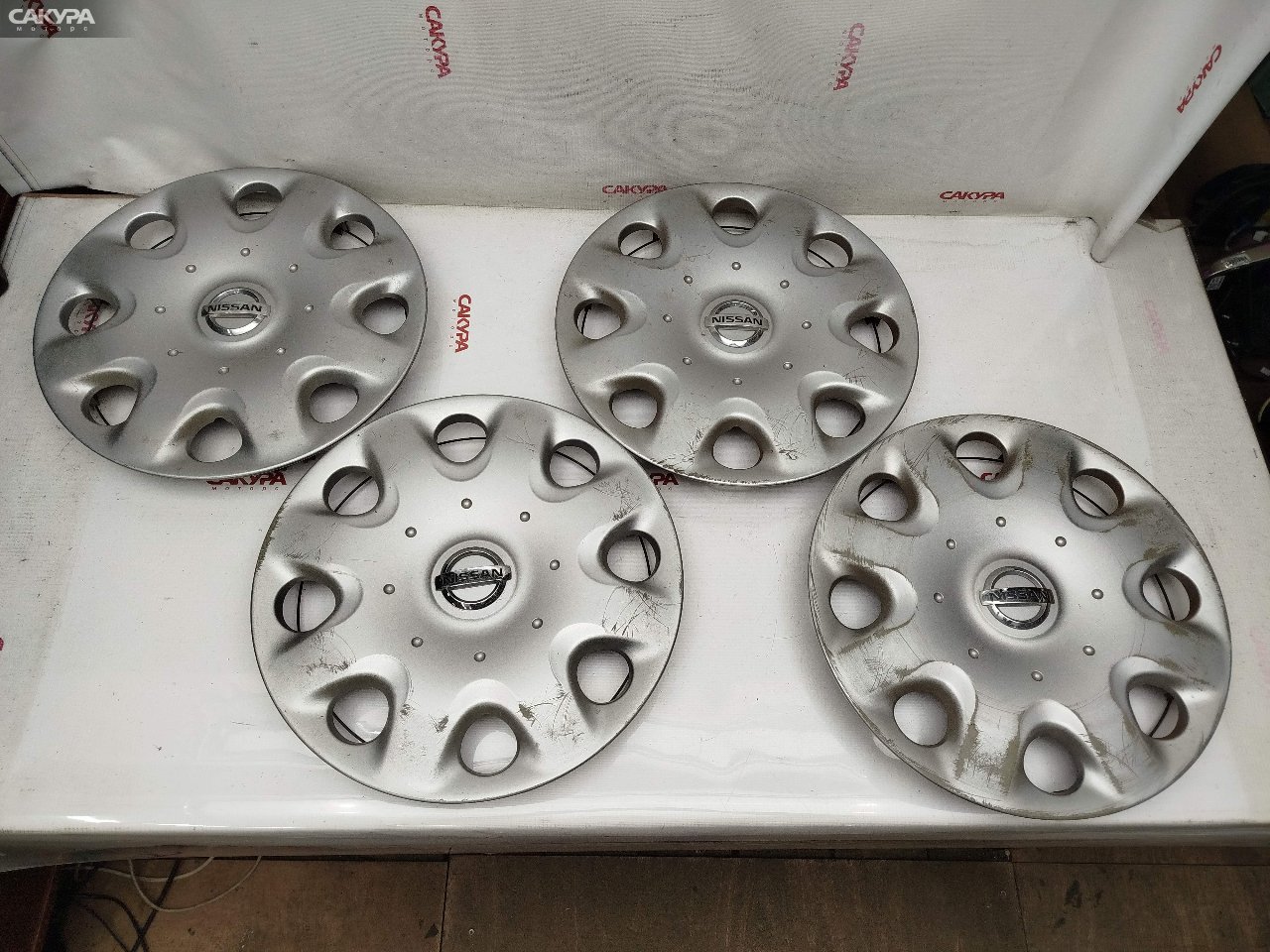 Колпак Nissan March AK12 CR12DE: купить в Сакура Красноярск.