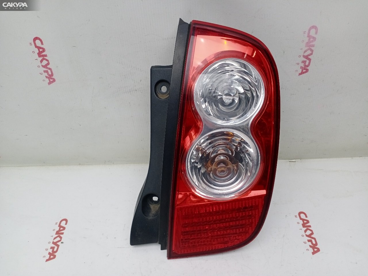 Фонарь стоп-сигнала правый Nissan March AK12 CR12DE D019: купить в Сакура Красноярск.