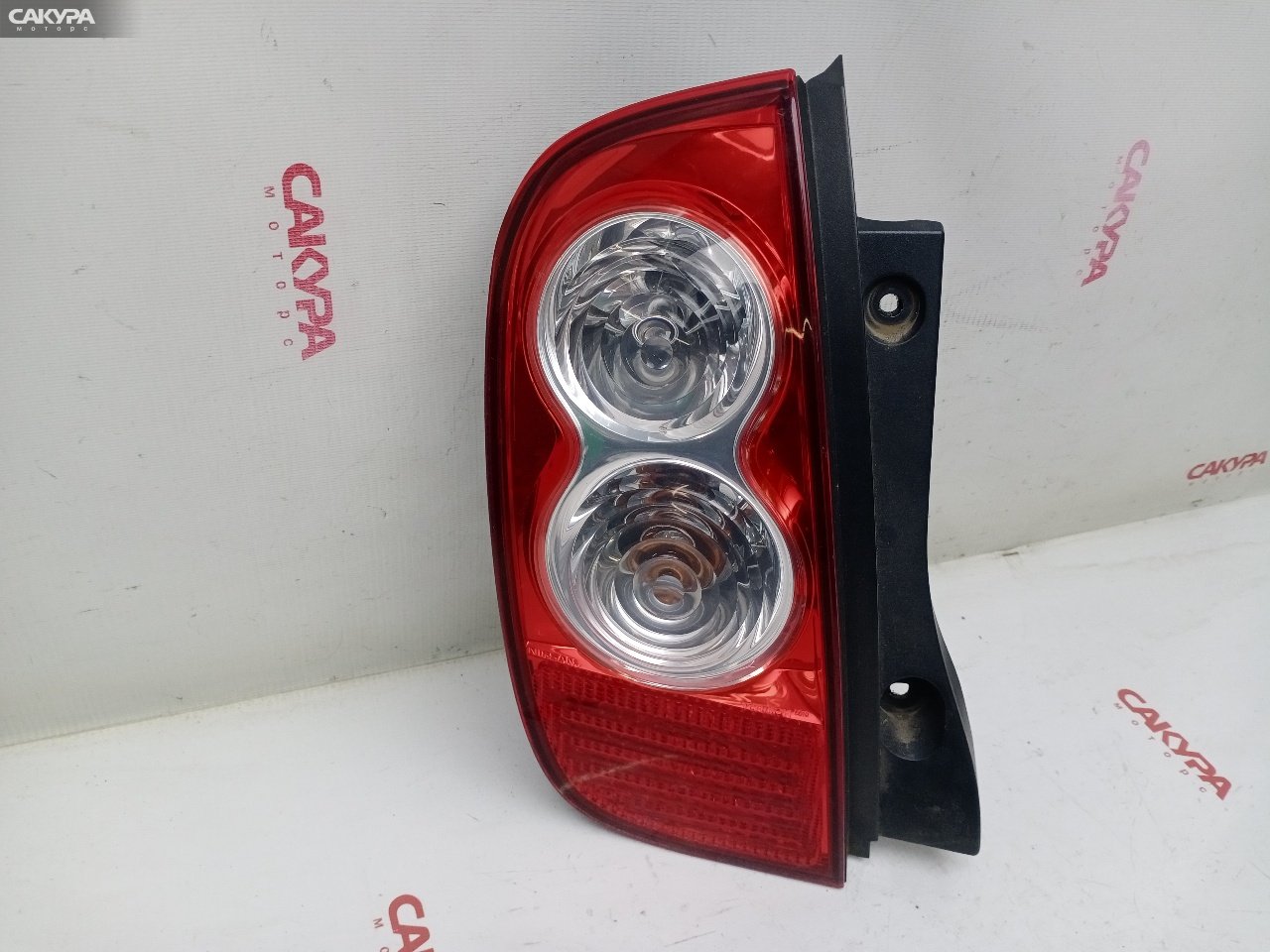 Фонарь стоп-сигнала левый Nissan March AK12 CR12DE D019: купить в Сакура Красноярск.