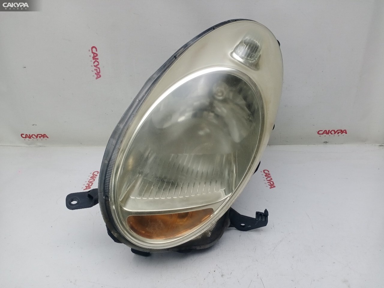 Фара левая Nissan March AK12 CR12DE 1816: купить в Сакура Красноярск.