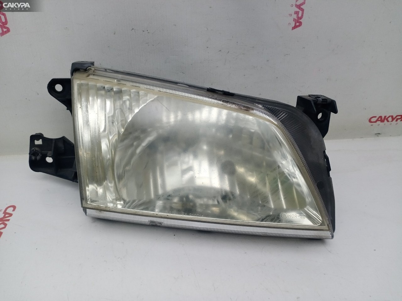 Фара правая Mazda Demio DW5W B5-E P1001: купить в Сакура Красноярск.