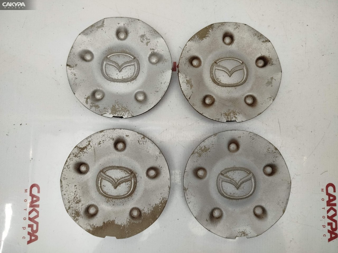 Колпак Mazda Demio DW5W B5-E: купить в Сакура Красноярск.