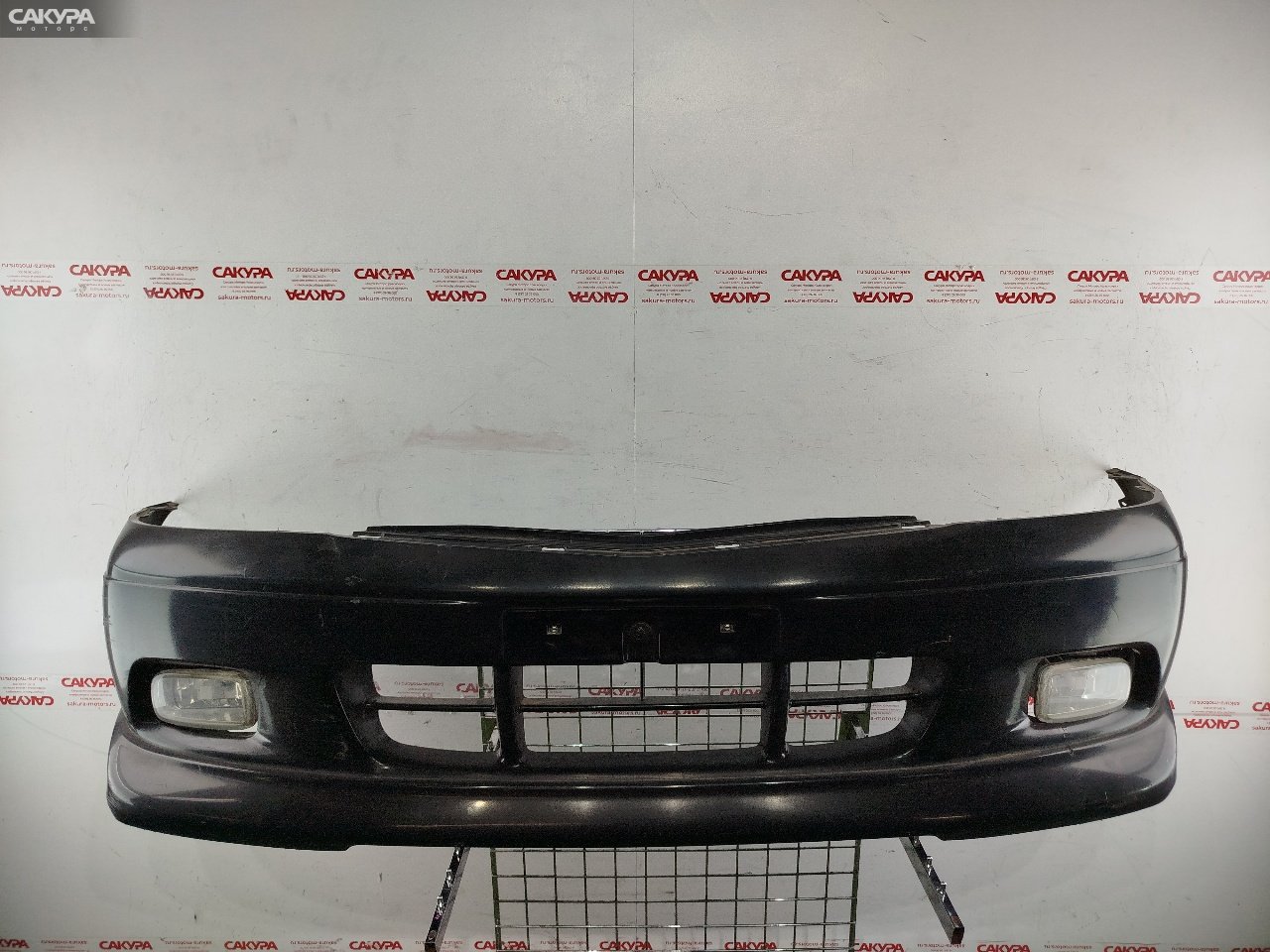 Бампер передний Mazda Demio DW5W B5-E A5A2: купить в Сакура Красноярск.