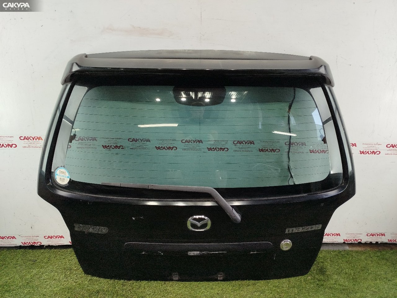 Дверь багажника Mazda Demio DW5W B5-E: купить в Сакура Красноярск.