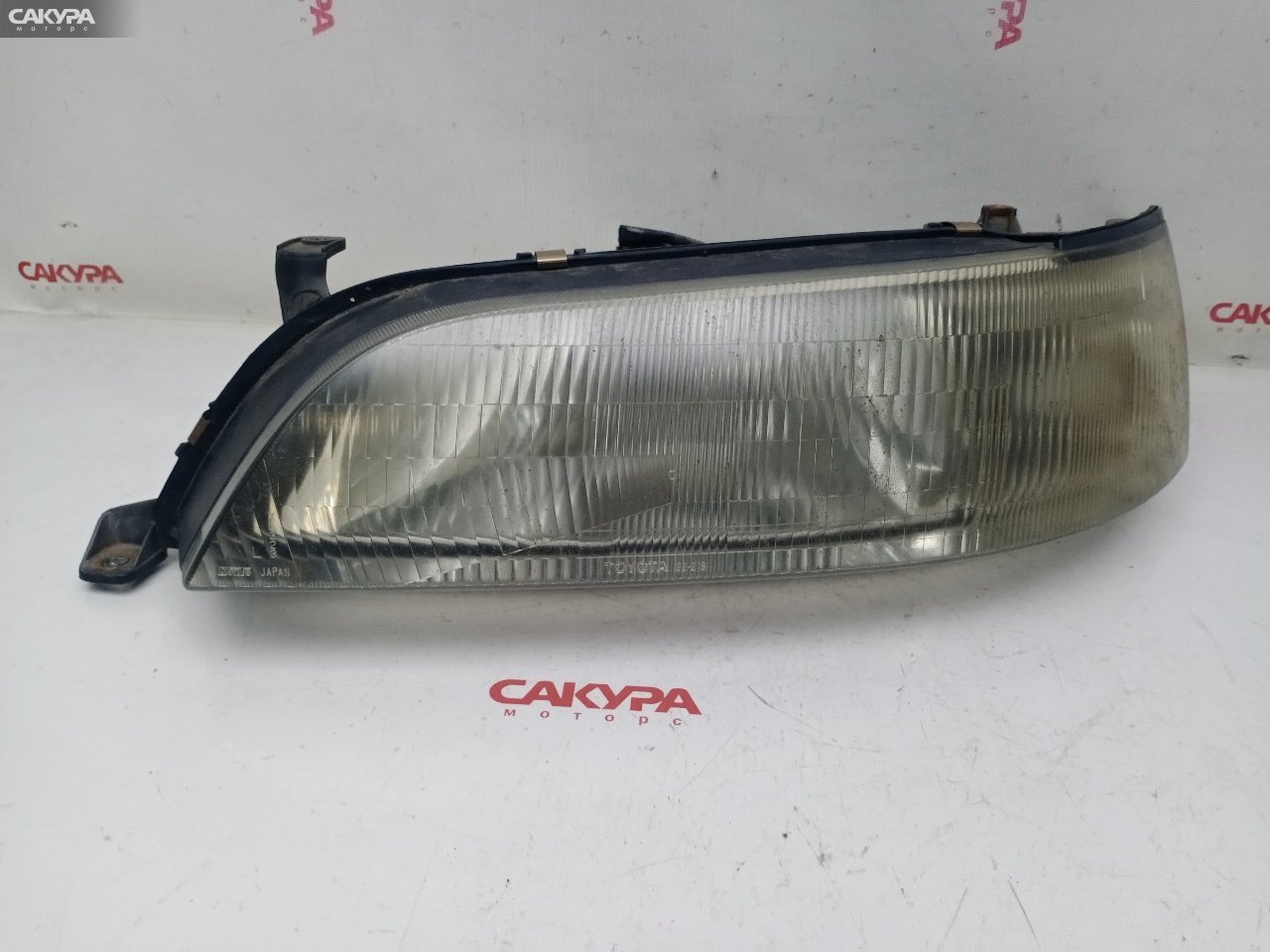 Фара левая Toyota Mark II GX90 1G-FE 22-218: купить в Сакура Красноярск.