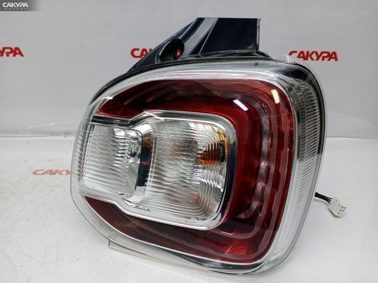 Фонарь стоп-сигнала правый Daihatsu Boon M700S 1KR-FE 220-69028: купить в Сакура Красноярск.