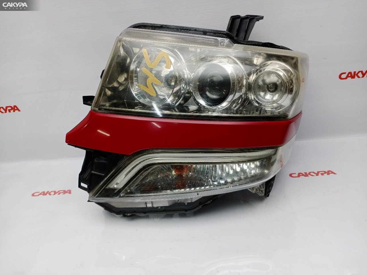 Фара левая Honda N-BOX CUSTOM JF1 S07A 100-62038: купить в Сакура Красноярск.
