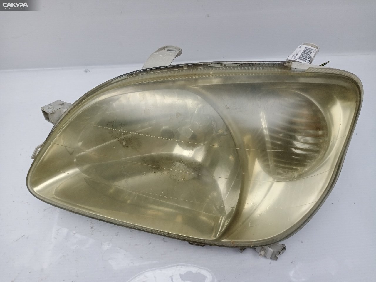 Фара левая Toyota Raum EXZ10 5E-FE 46-1: купить в Сакура Красноярск.