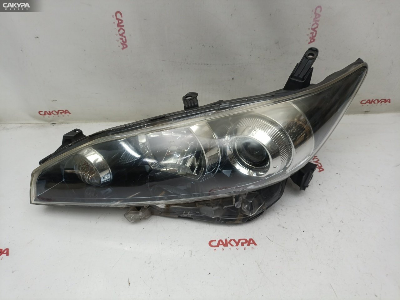 Фара левая Toyota Wish ZGE20 2ZR-FAE 68-16: купить в Сакура Красноярск.