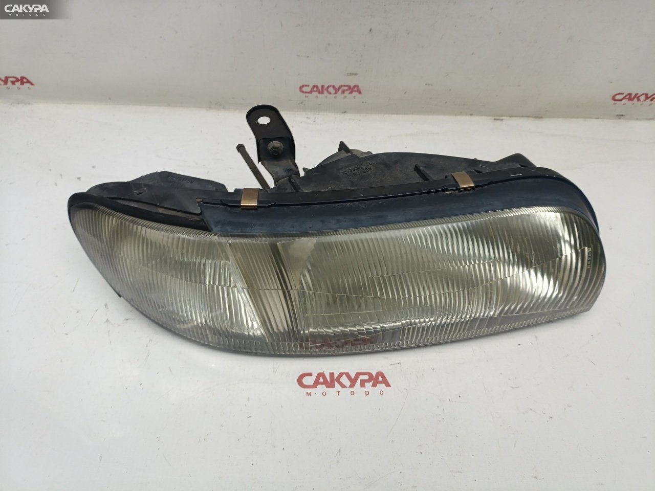 Фара правая Nissan Bluebird EU13 SR18DE 1450: купить в Сакура Красноярск.