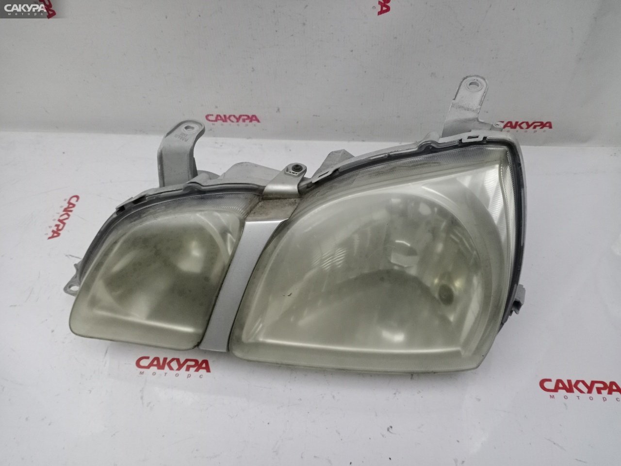 Фара левая Toyota Gaia ACM10G 1AZ-FSE 44-48: купить в Сакура Красноярск.
