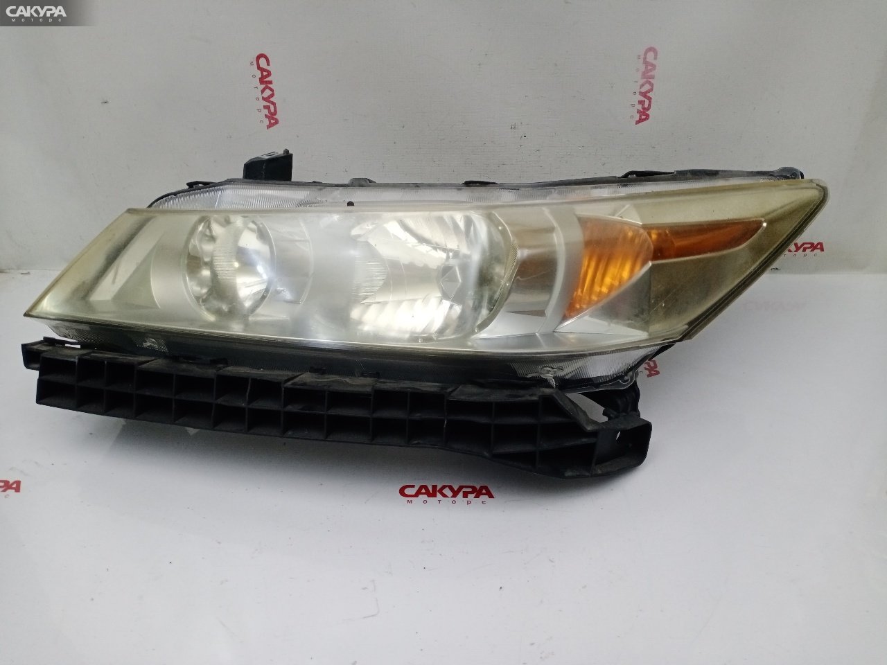 Фара левая Honda Stream RN6 R18A 100-22652: купить в Сакура Красноярск.