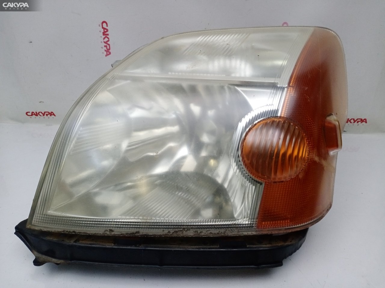 Фара левая Honda Mobilio GB2 L15A 100-22433: купить в Сакура Красноярск.