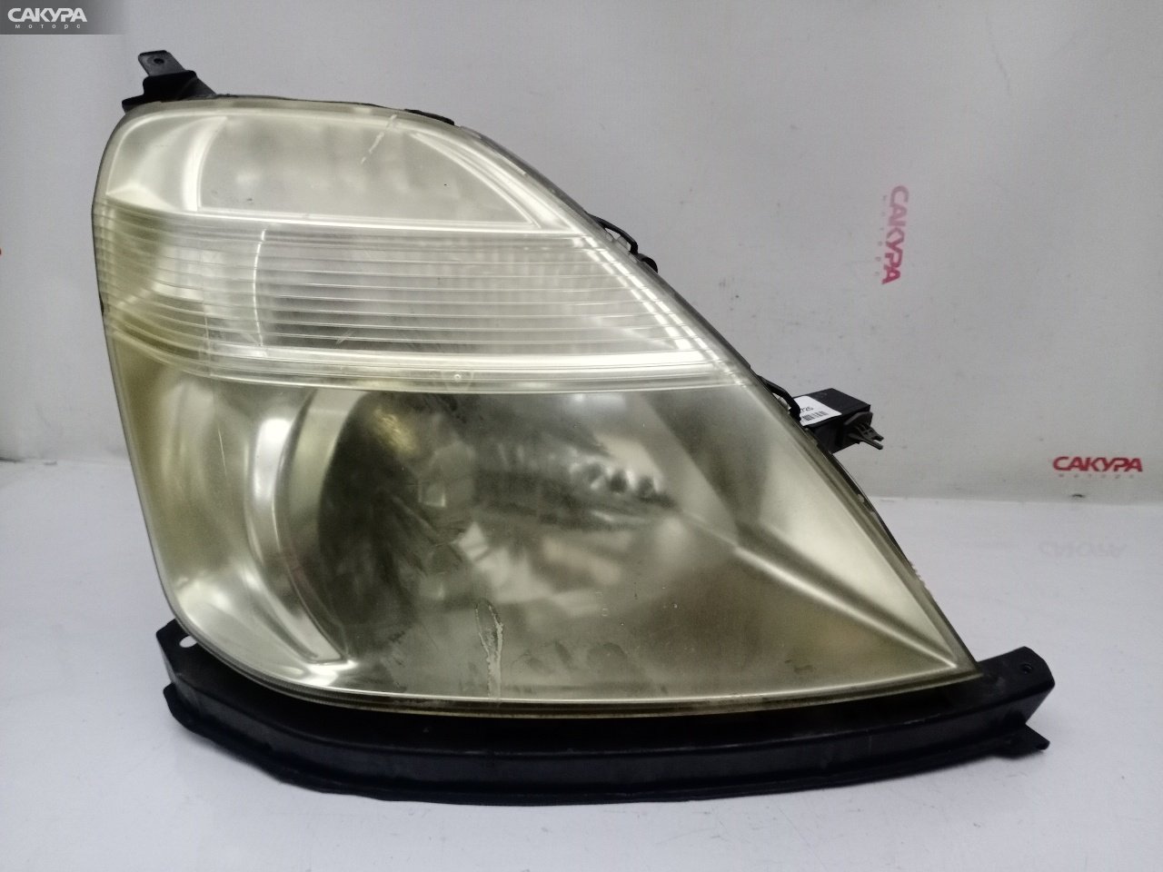 Фара правая Honda Stream RN3 K20A 100-22363: купить в Сакура Красноярск.