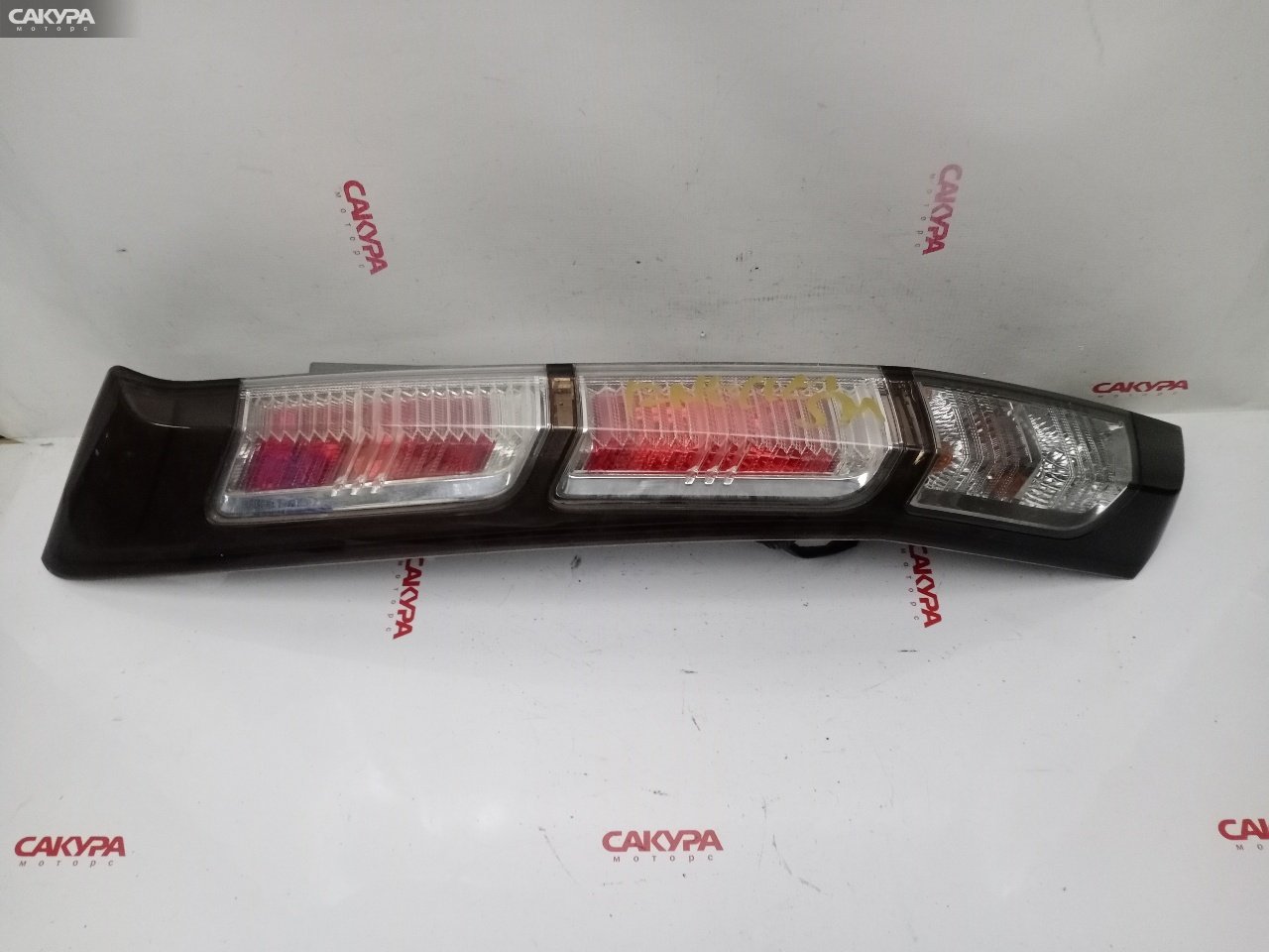 Фонарь стоп-сигнала левый Honda Stream RN6 R18A D079: купить в Сакура Красноярск.