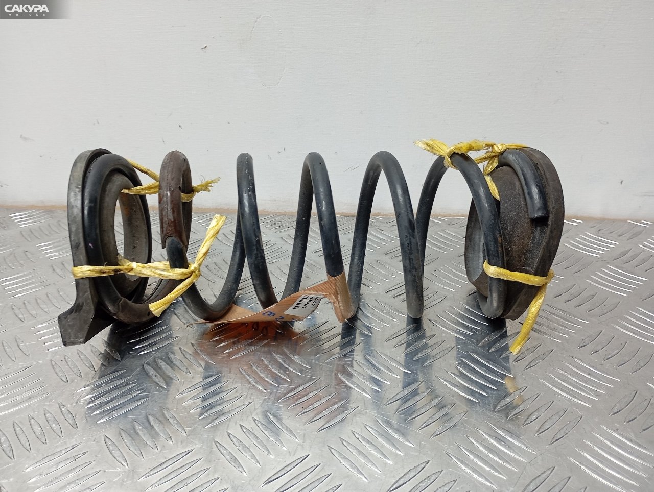 Пружина подвески задняя Toyota Passo M700A 1KR-FE: купить в Сакура Красноярск.