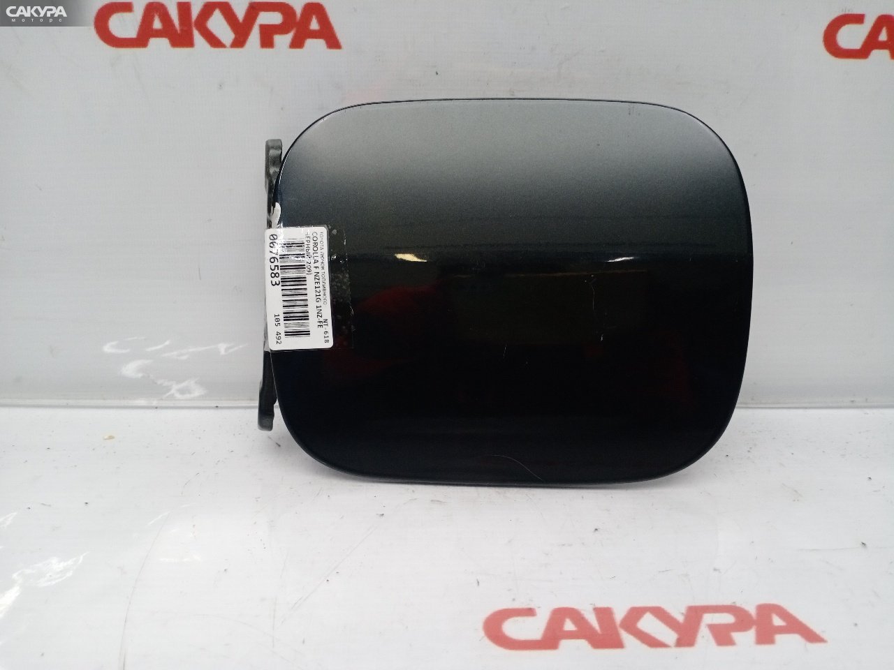 Лючок топливного бака Toyota Corolla Fielder NZE121G 1NZ-FE: купить в Сакура Красноярск.