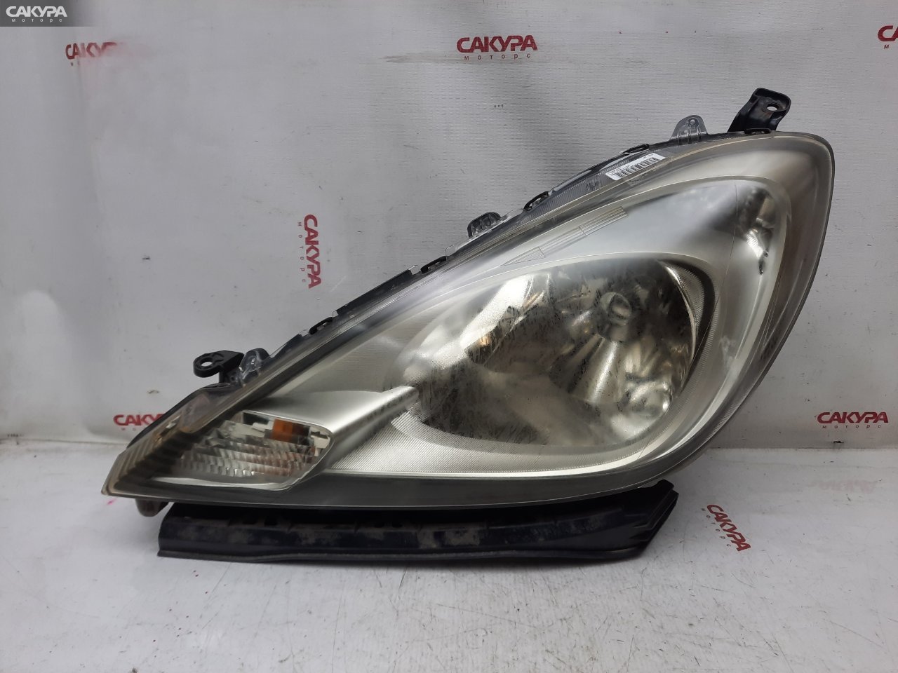Фара левая Honda FIT GE6 L13A P9604: купить в Сакура Красноярск.