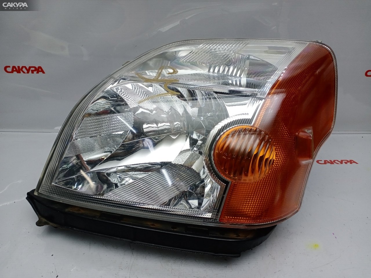 Фара левая Honda Mobilio GB1 L15A 100-22433: купить в Сакура Красноярск.
