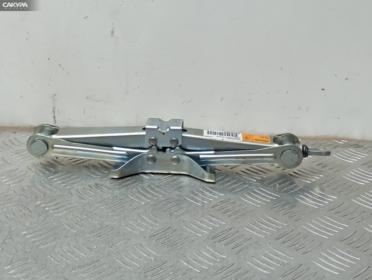 Домкрат Nissan March AK12 CR12DE: купить в Сакура Красноярск.