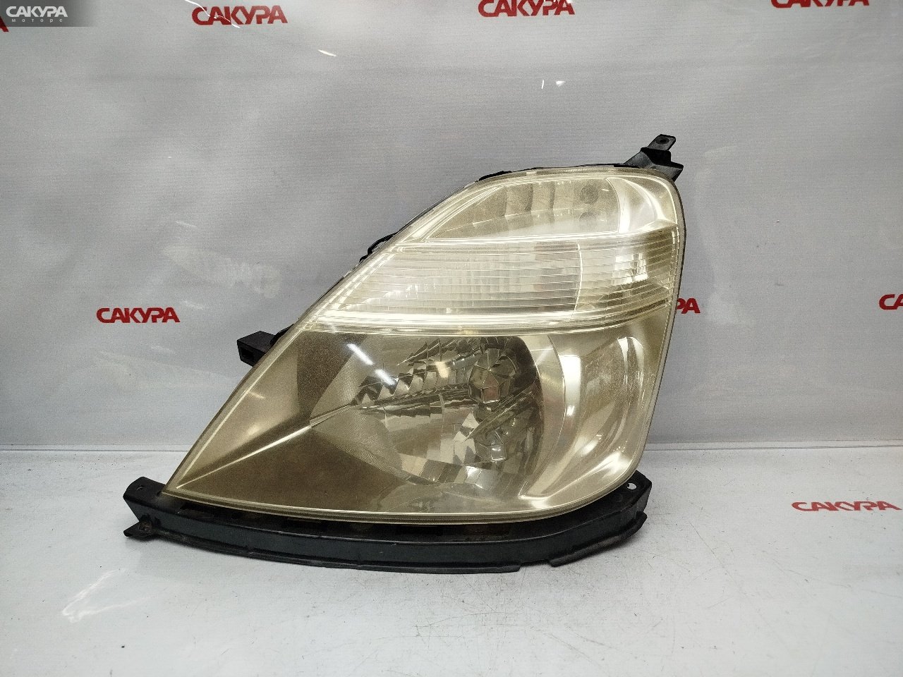 Фара левая Honda Stream RN3 K20A 100-22369: купить в Сакура Красноярск.