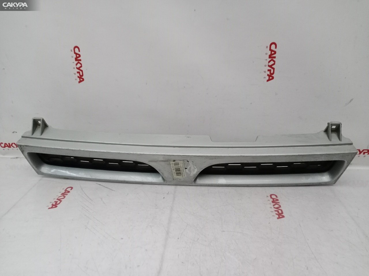 Решетка радиатора Nissan Pulsar N14: купить в Сакура Красноярск.