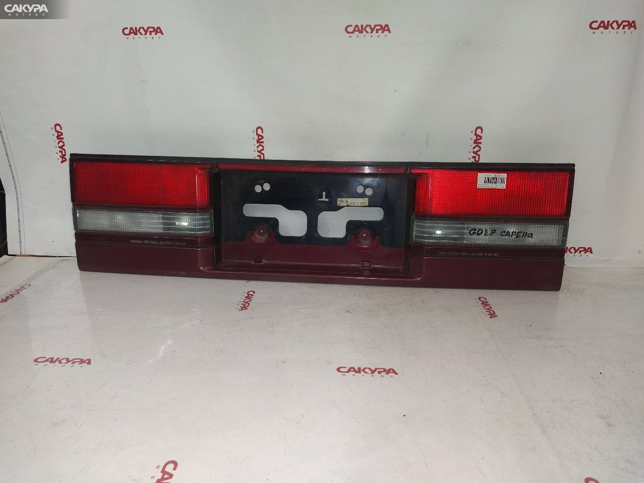 Фонарь вставка багажника Mazda Capella GD8P 016-7851: купить в Сакура Красноярск.