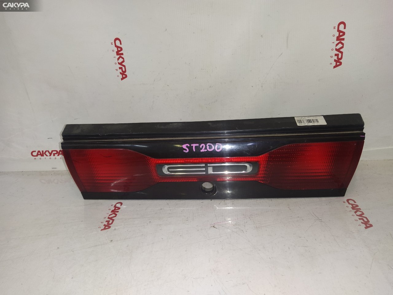 Фонарь вставка багажника Toyota Carina ED ST202: купить в Сакура Красноярск.