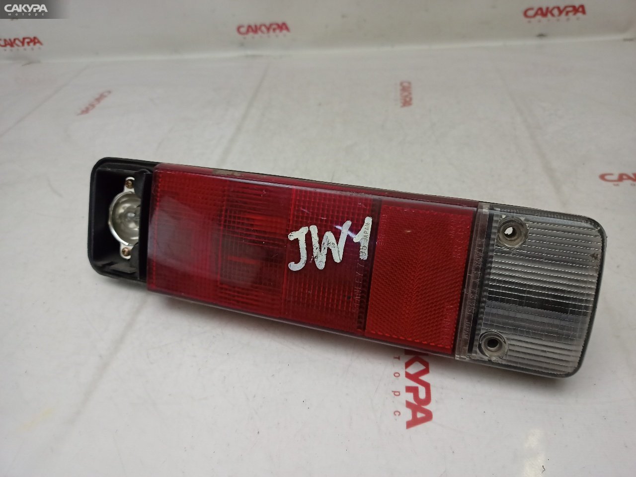 Фонарь стоп-сигнала левый Honda Today JW1 7395: купить в Сакура Красноярск.