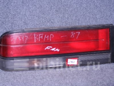 Купить Фонарь стоп-сигнала на Mazda Familia BFMP левый  в Красноярске